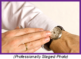 Man looking at wristwatch. Staged scene with professional model.